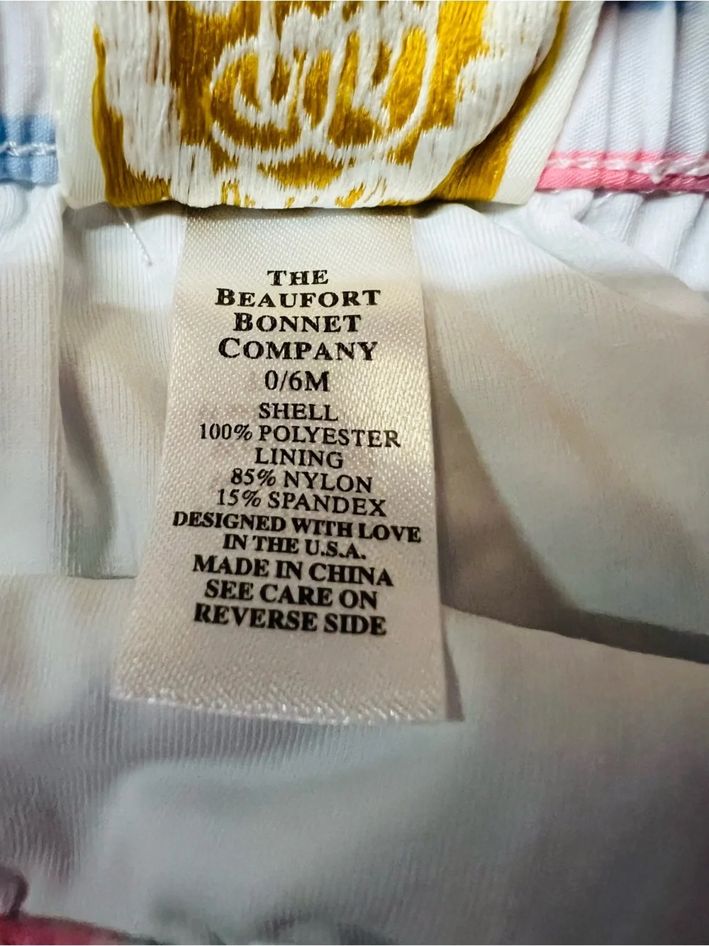 The Beaufort Bonnet Company Boys' White Swim Trunks with Pastel Stripes